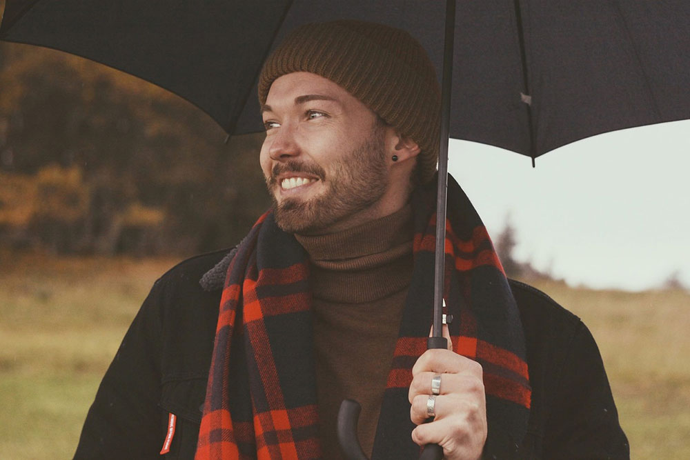 Man With Umbrella Smiling